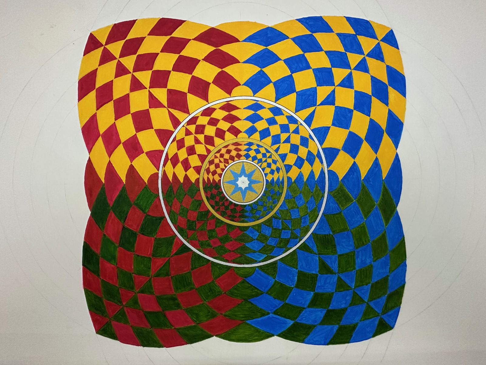 Blue closing the wheel, white rings scribed over the field